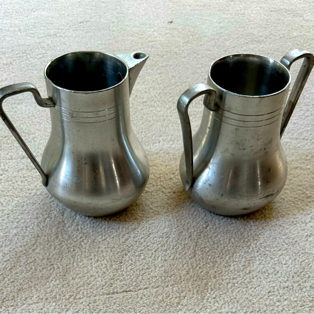 Singapore pewter sugar and creamer.